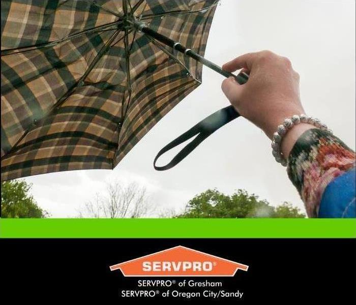 hand holding umbrella 