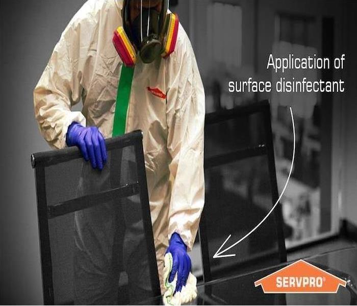 SERVPRO technicians cleaning in PPE