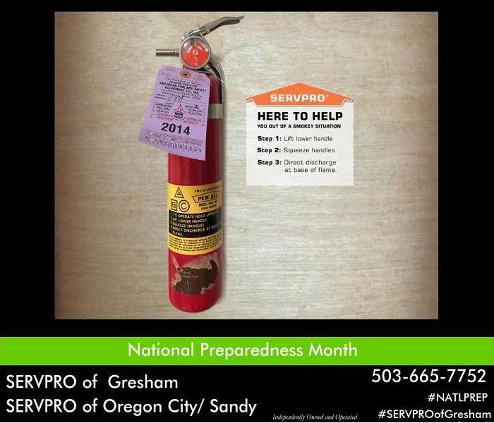 Fire extinguisher with three steps on how to use listed under orange SERVPRO house logo. 